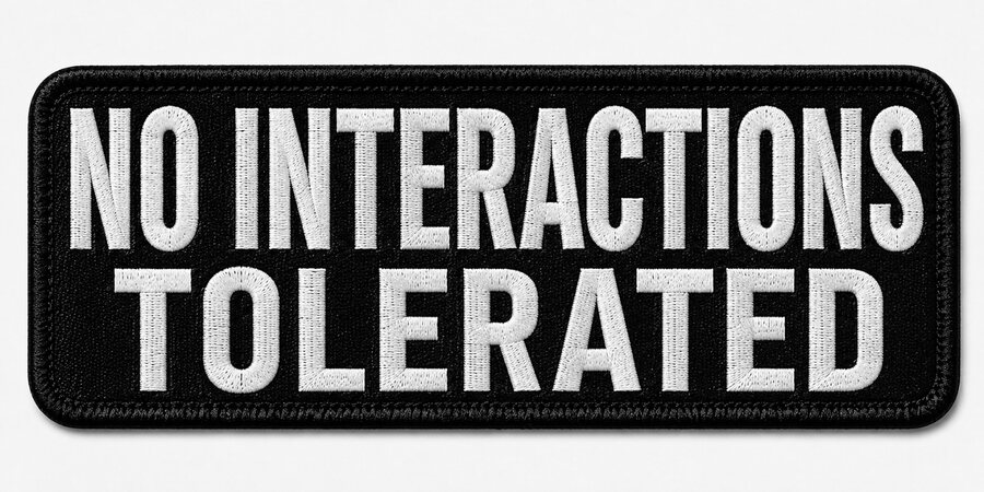 Black embroidered badge reading No Interactions Tolerated